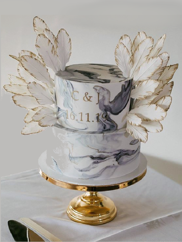 C & J wedding cake. Marble with wings.